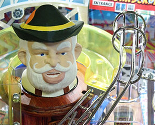 A close up of a toy man with a hat